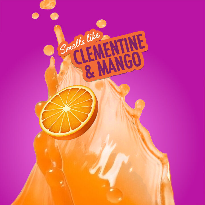 Splash of orange liquid with a clementine slice and "Smells like Clementine & Mango" text on a pink background, representing NYX Juicy Boo fragrance.