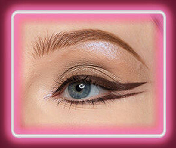 Close-up of an eye with NYX Professional Makeup Lid Lingerie Cream Eye Pigment in 06 Mocha Mesh used to line and define the eye